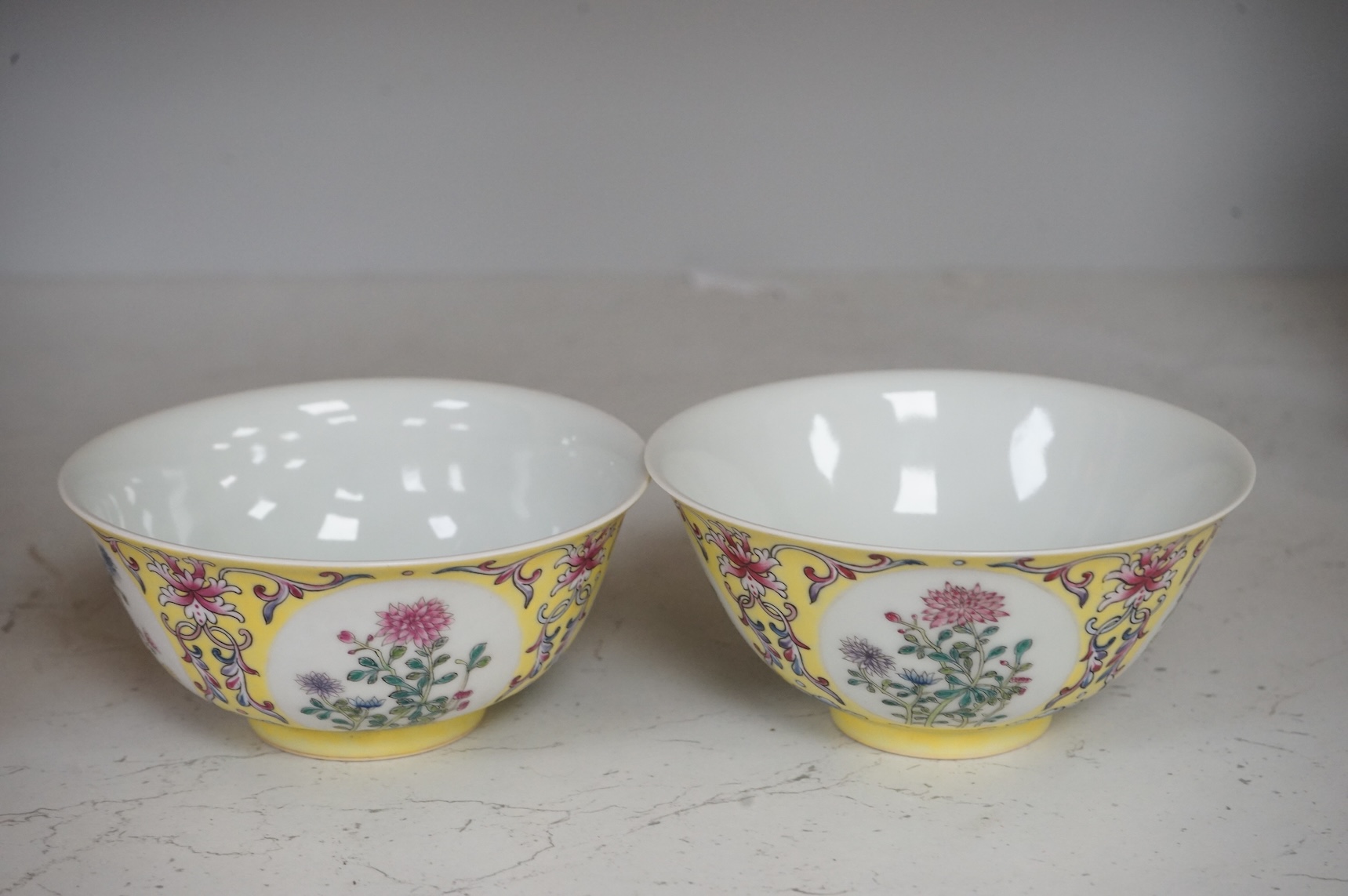 A pair of Chinese yellow ground medallion bowls, 13cm diameter
